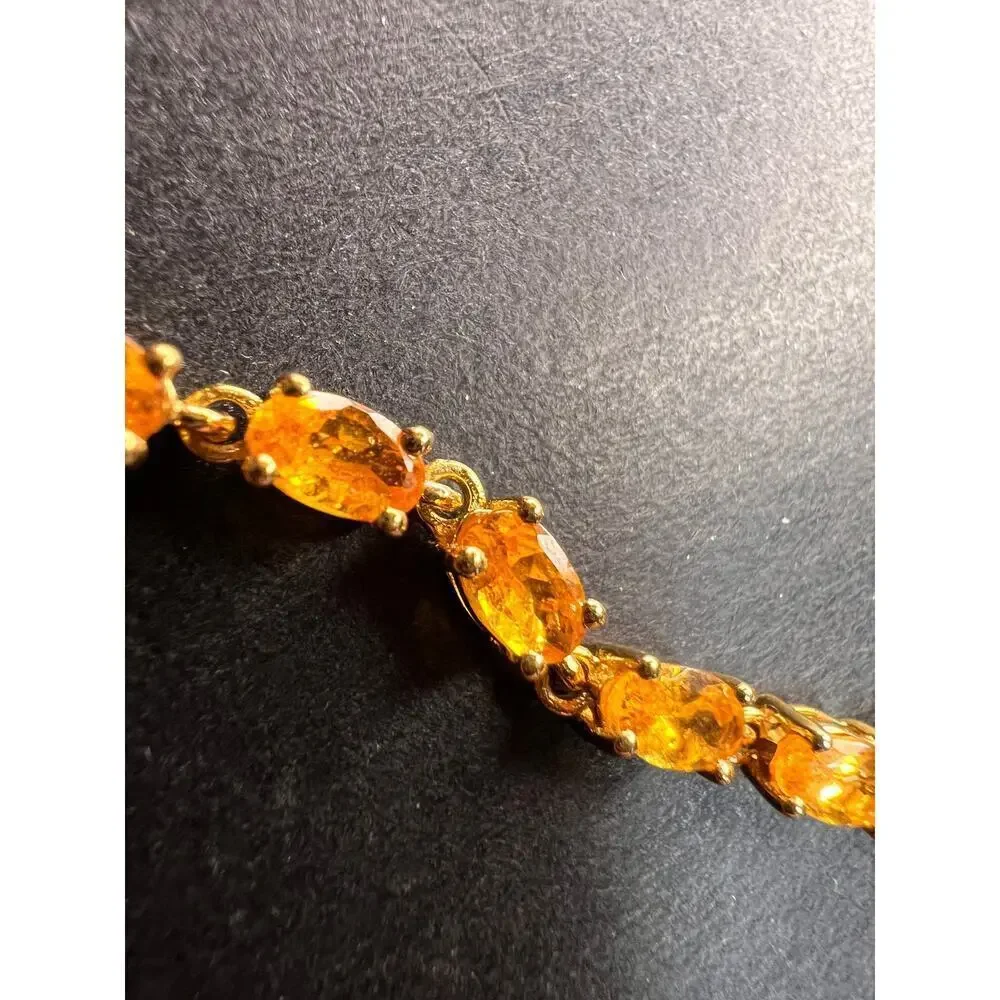 Yellow spessartine garnet tennis bracelet in gold over sterling silver